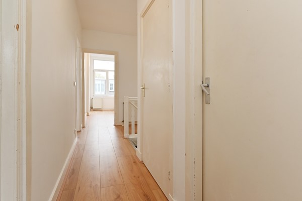 Medium property photo - Deimanstraat 309, 2522 BK Den Haag